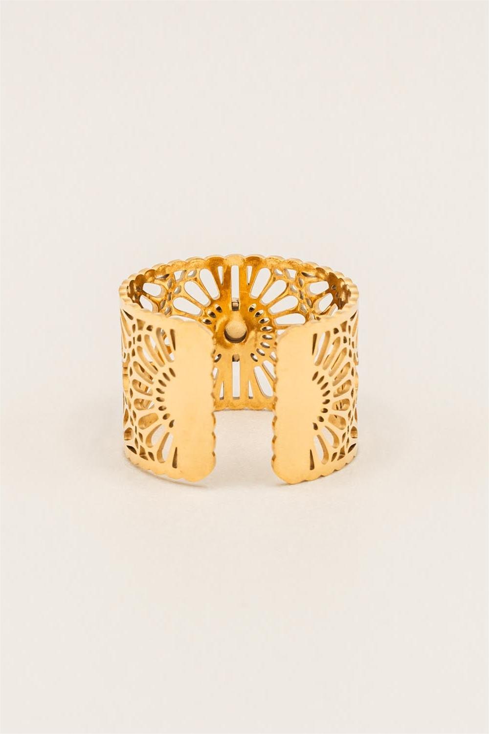 Anillo de metal con flor hueca