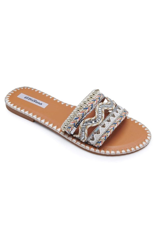 Pantuflas planas con cristales ondulados y pensamientos