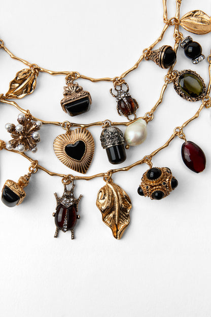 Conjunto de tres collares con múltiples piedras preciosas 