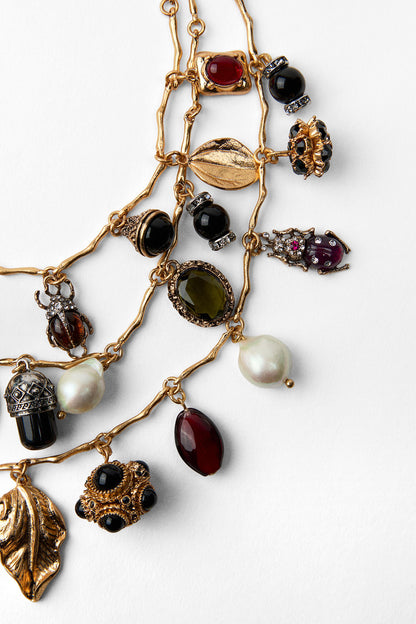 Conjunto de tres collares con múltiples piedras preciosas 