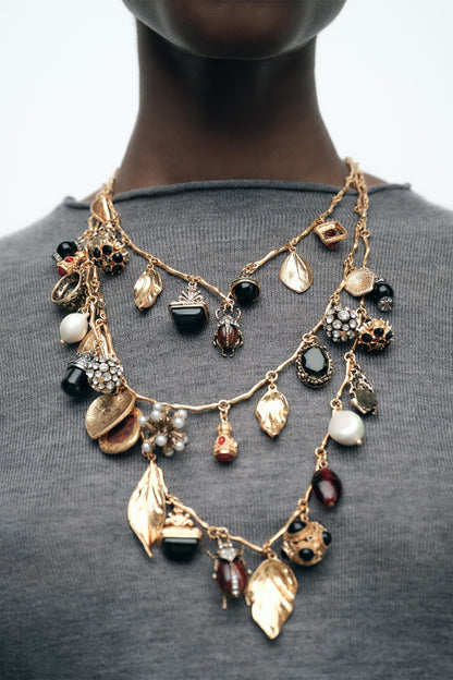 Conjunto de tres collares con múltiples piedras preciosas 