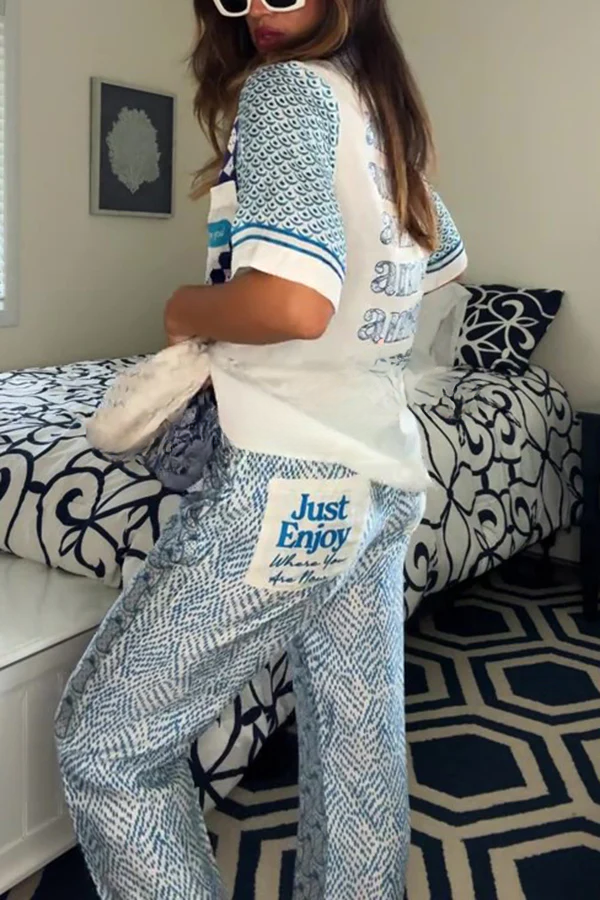 Conjunto de camisa holgada de manga corta con estampado de dragón único y pantalones con bolsillo en la cintura elástica