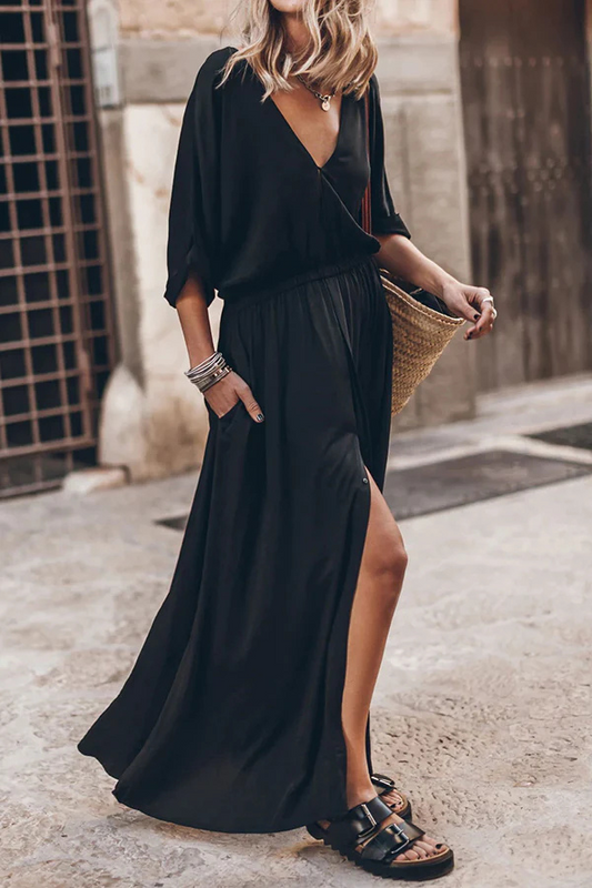 Vestido largo con abertura y bolsillos, cintura elástica y mangas estilo kimono, suave y elegante.