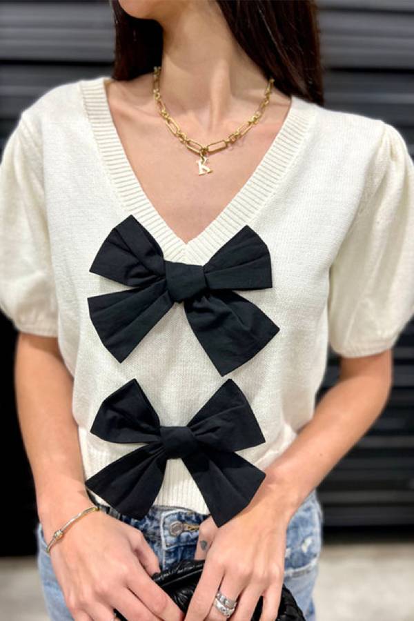 Suéter liso de manga corta con cuello en V y doble lazo
