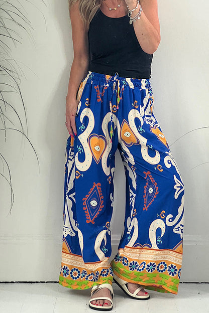 Pantalones con cintura elástica y cordón ajustable con bolsillos y estampado de Reina de Corazones