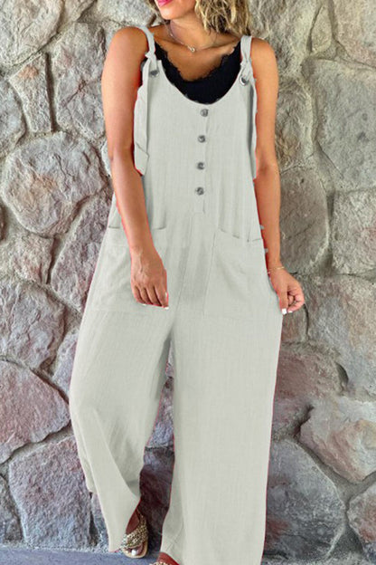 Mono Cassie de pierna ancha con tirantes y bolsillo de parche con botones