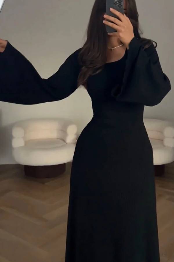 Elegante vestido de punto con lazo en la cintura