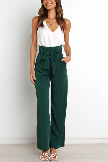 Pantalones anchos con bolsillos y cinturón de moda