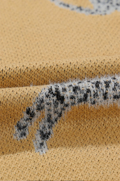 Suéter de punto con hombros caídos y estampado animal color camello