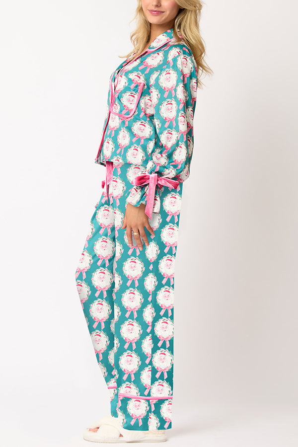 Conjunto de top de terciopelo con estampado navideño, manga larga, bolsillos y pantalones anchos con cintura elástica.