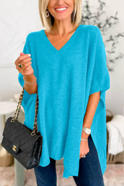 Suéter tipo poncho holgado de color liso con cuello en V