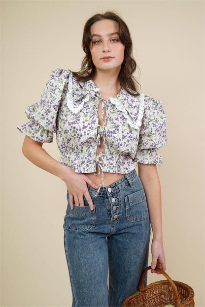 Blusa con cuello de muñeca y mangas abullonadas con estampado floral 