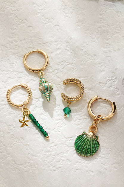 Conjunto de cuatro pendientes colgantes de estrella de mar y concha 