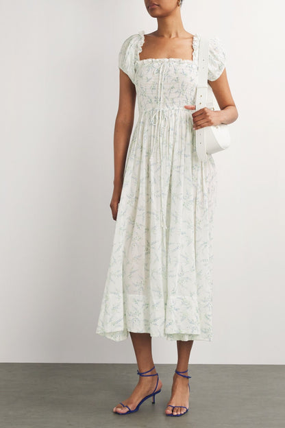 Vestido midi con mangas abullonadas y fruncido floral 