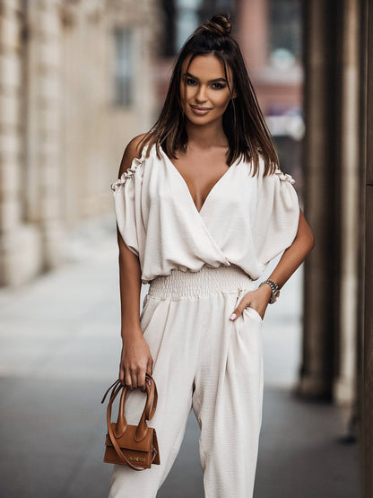 Mono informal con cintura elástica y bolsillos y cuello en V para mujer
