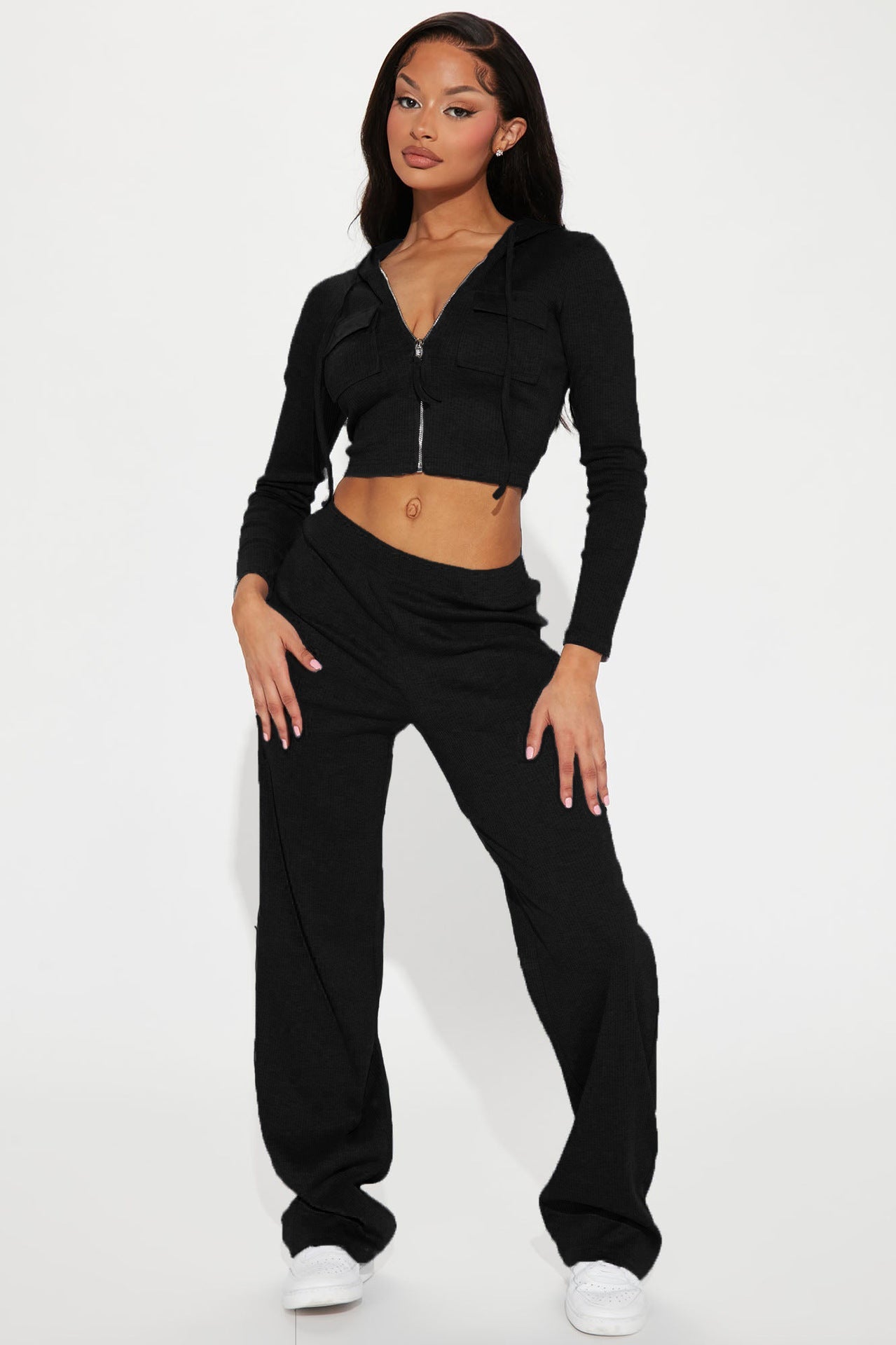 Conjunto deportivo de dos piezas con capucha y pantalones holgados informales de punto