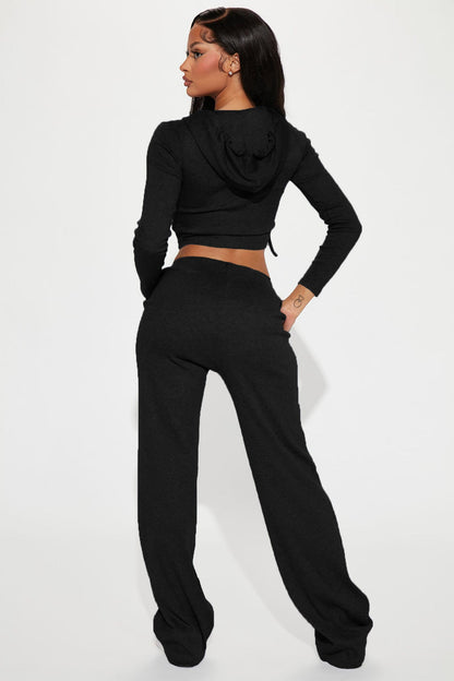 Conjunto deportivo de dos piezas con capucha y pantalones holgados informales de punto