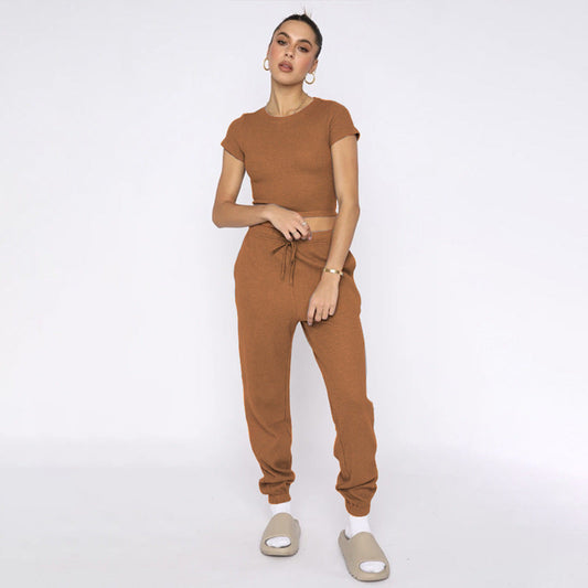 Conjuntos de pantalones casuales de manga corta con cuello redondo y estampado de gofres de color liso para primavera y verano para mujer