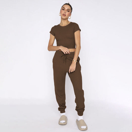 Conjuntos de pantalones casuales de manga corta con cuello redondo y estampado de gofres de color liso para primavera y verano para mujer