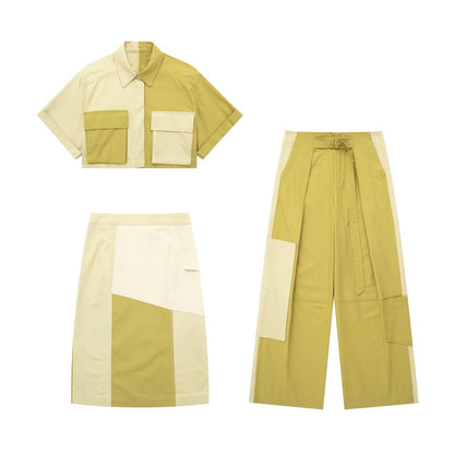 Gabardina de retazos de tela, camisa corta, falda de retazos, decoración de bolsillo, pantalón ajustado, traje para mujer