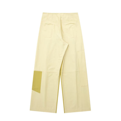 Gabardina de retazos de tela, camisa corta, falda de retazos, decoración de bolsillo, pantalón ajustado, traje para mujer