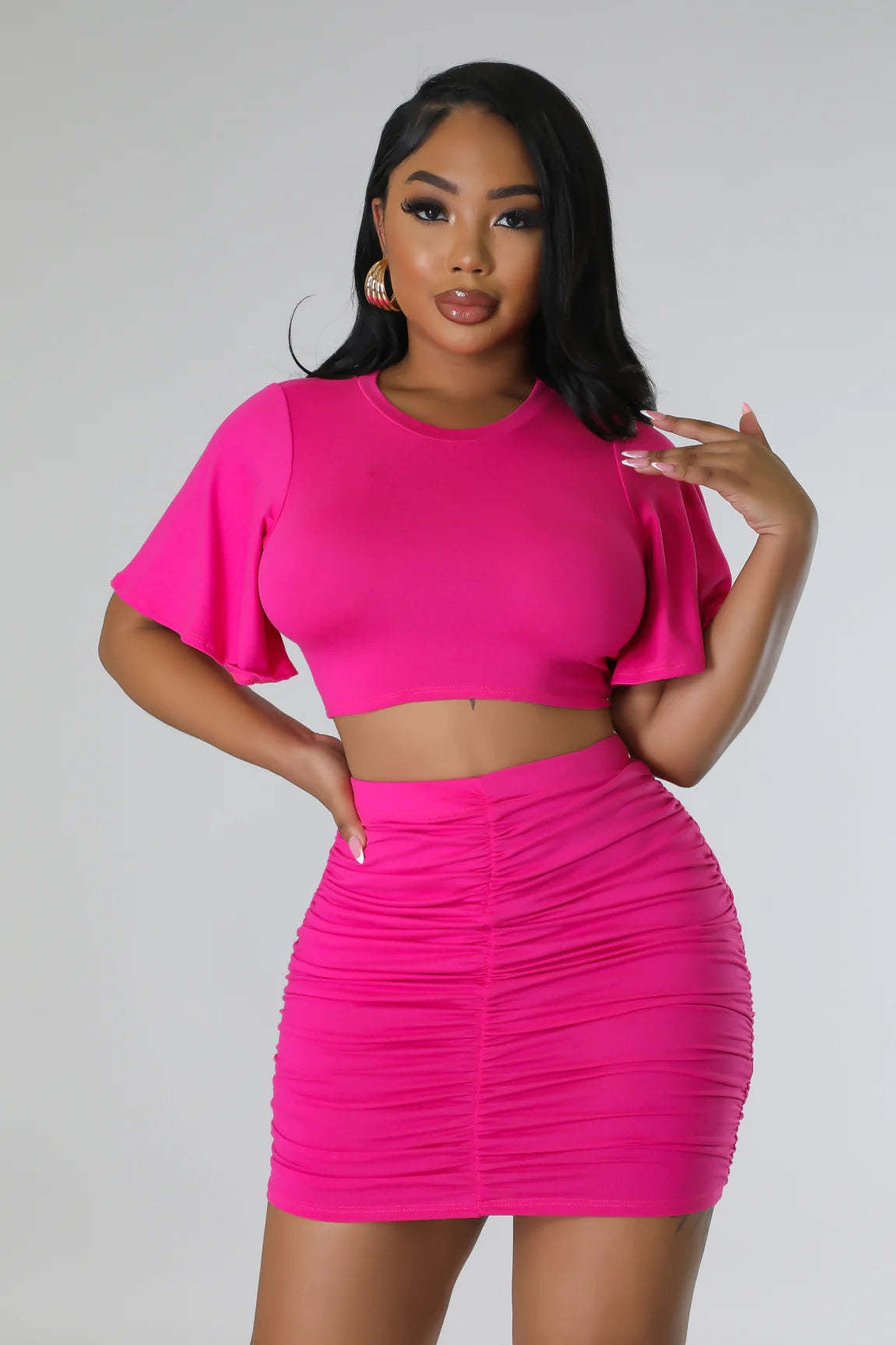Conjunto de dos piezas formado por top corto y falda a la cadera, sexy, para mujer
