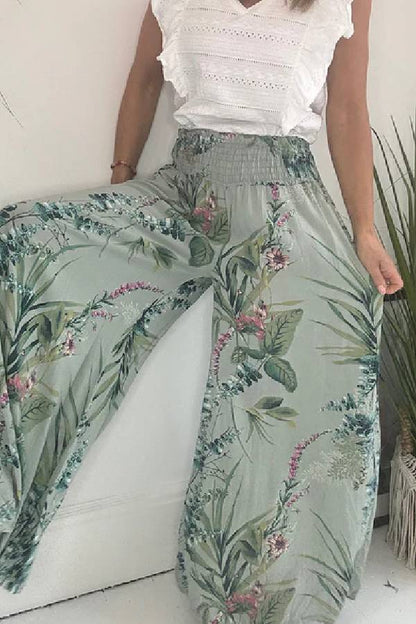 Pantalones palazzo de pierna ancha con cintura fruncida y estampado botánico de jardín de verano