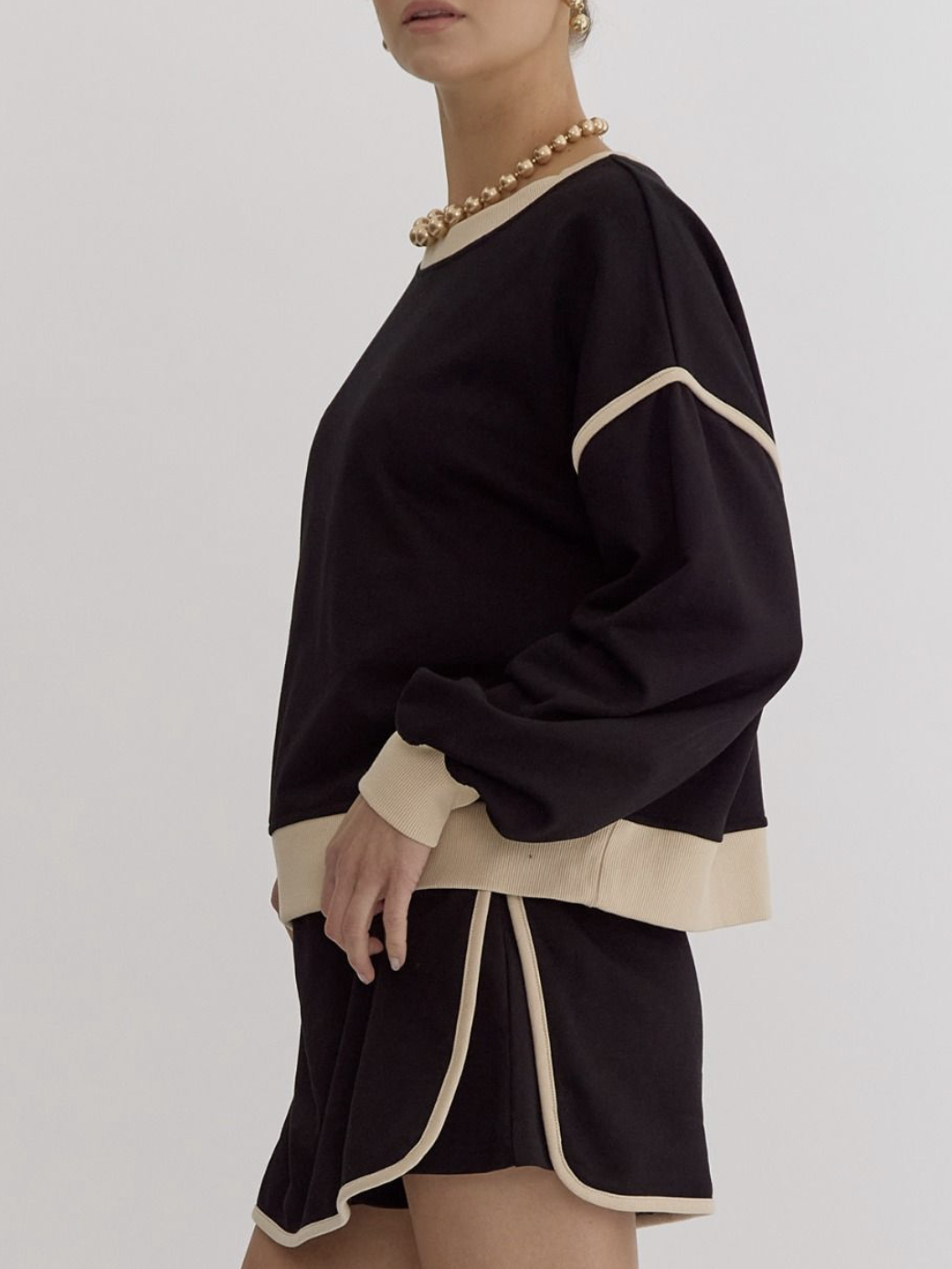 Traje de otoño para mujer, suéter holgado de algodón multicolor, falda de imitación y pantalones cortos.