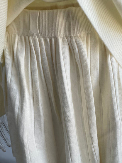 Conjunto de suéter y falda plisada de cuello redondo de color liso para mujer, conjuntos de falda de punto