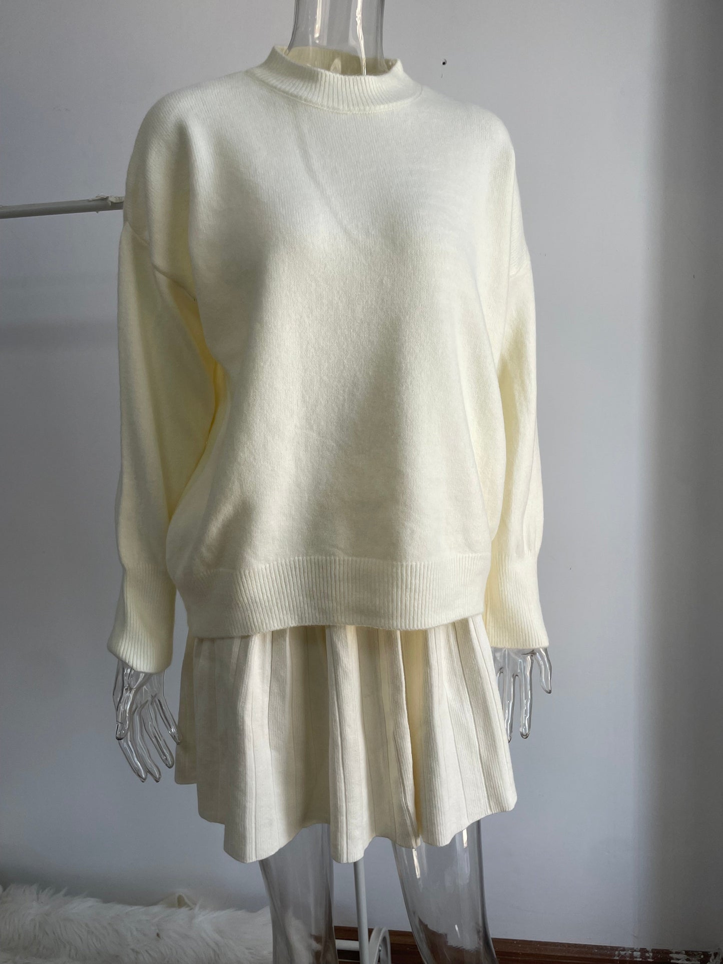 Conjunto de suéter y falda plisada de cuello redondo de color liso para mujer, conjuntos de falda de punto