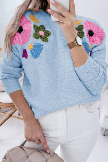 Suéter azul claro con estampado de flores de los años 60 y bordes acanalados 