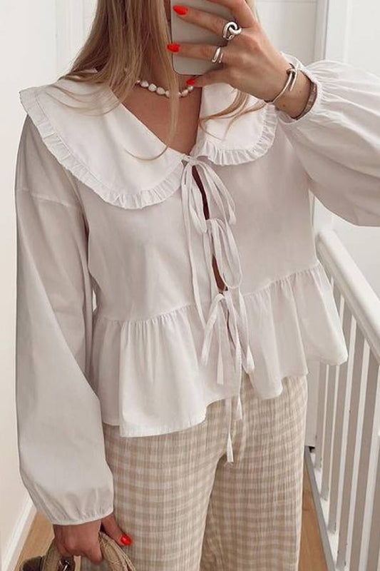 Camisa tipo cárdigan de manga larga con cordones en color liso
