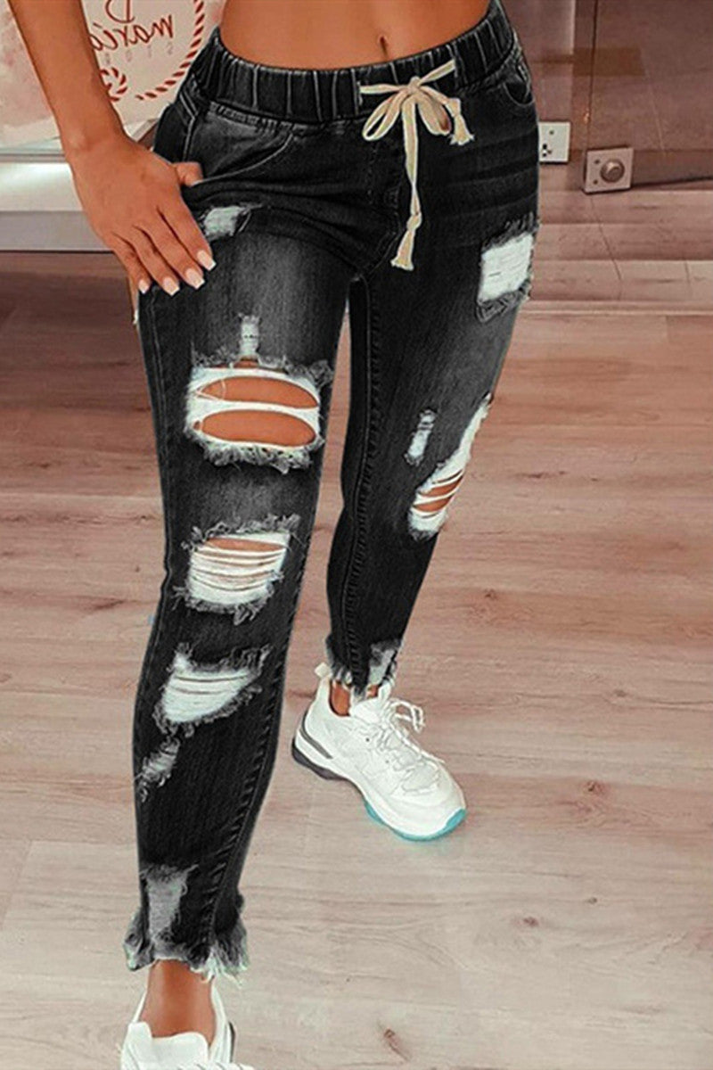 Vaqueros de cintura media rasgados, casuales y de moda