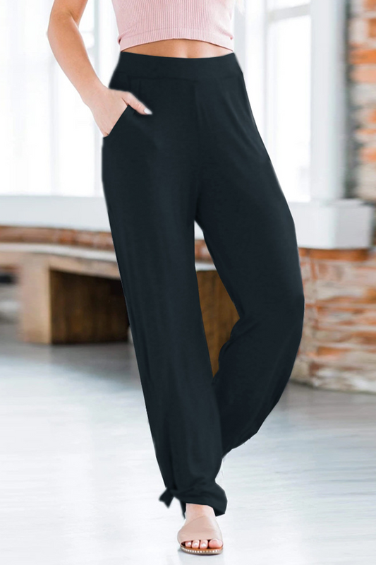 Pantalones casuales de color liso, holgados, con pernera ancha y nudos, con aberturas.