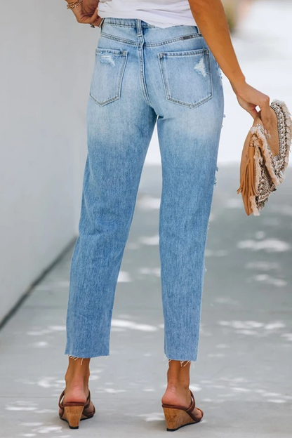 Pantalones de tubo de color liso con borlas rasgadas y estilo callejero
