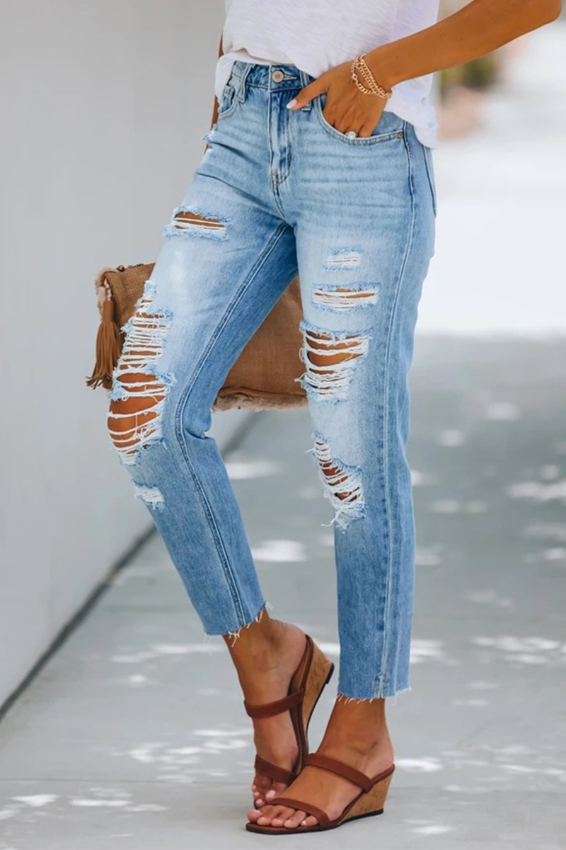 Pantalones de tubo de color liso con borlas rasgadas y estilo callejero