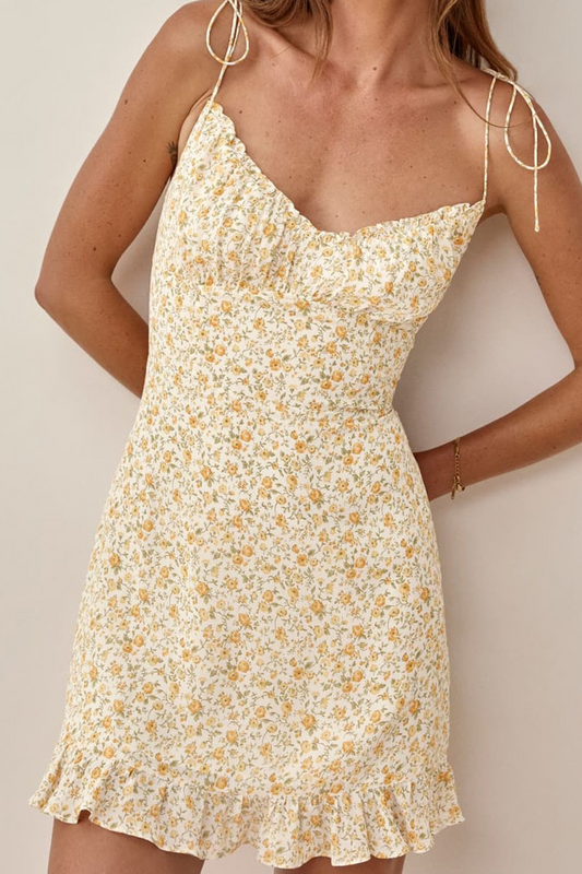 Elegante vestido de corte A con escote en V, orillo fibroso y frenillo floral