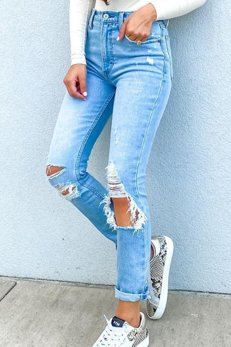 Pantalones de tubo rasgados con borlas lisas de calle de color liso