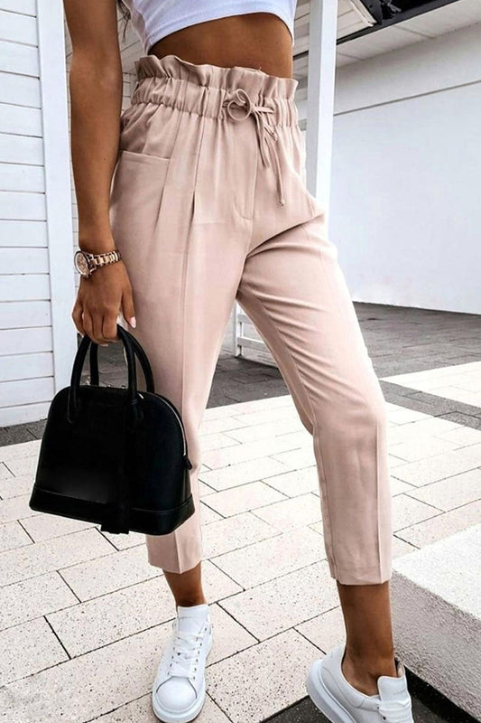 Pantalones casuales de moda con abertura en la parte inferior