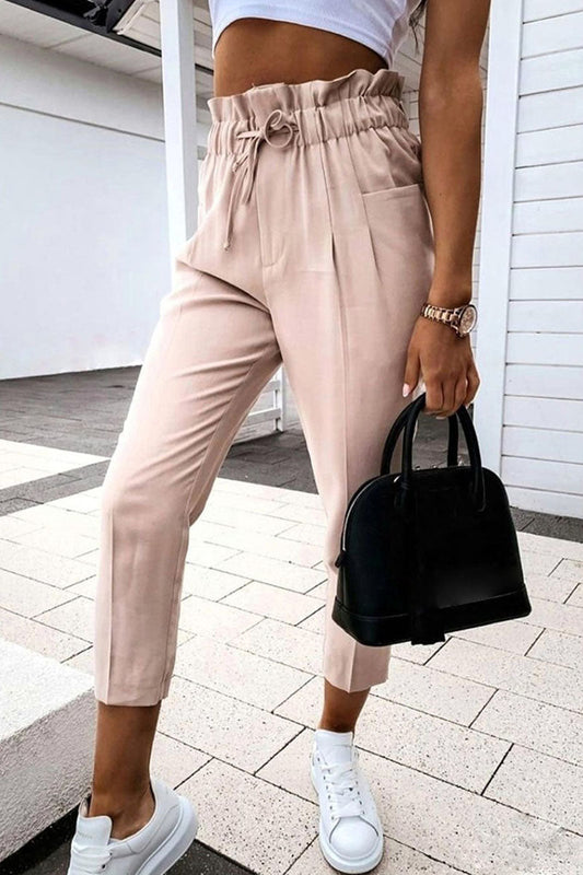 Pantalones casuales de moda con abertura en la parte inferior