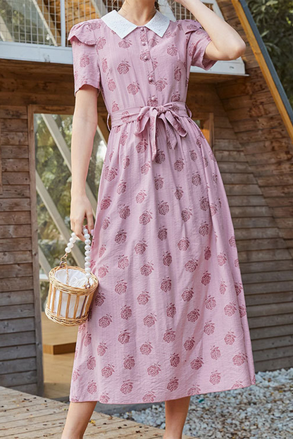 Elegante vestido de corte A con cuello vuelto, hebilla floral y cinturón