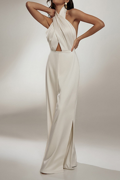 Mono elegante de moda con cuello halter, espalda descubierta y parches sólidos