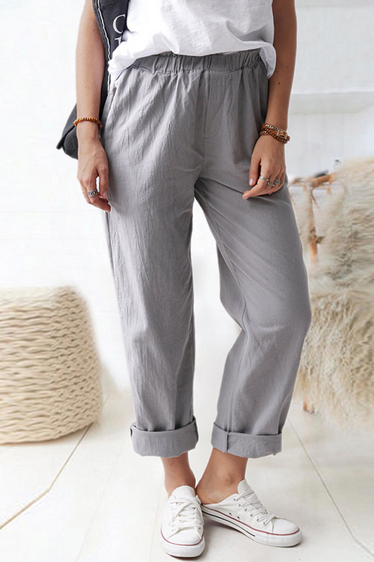 Pantalones casuales de color liso con bolsillos y parches lisos
