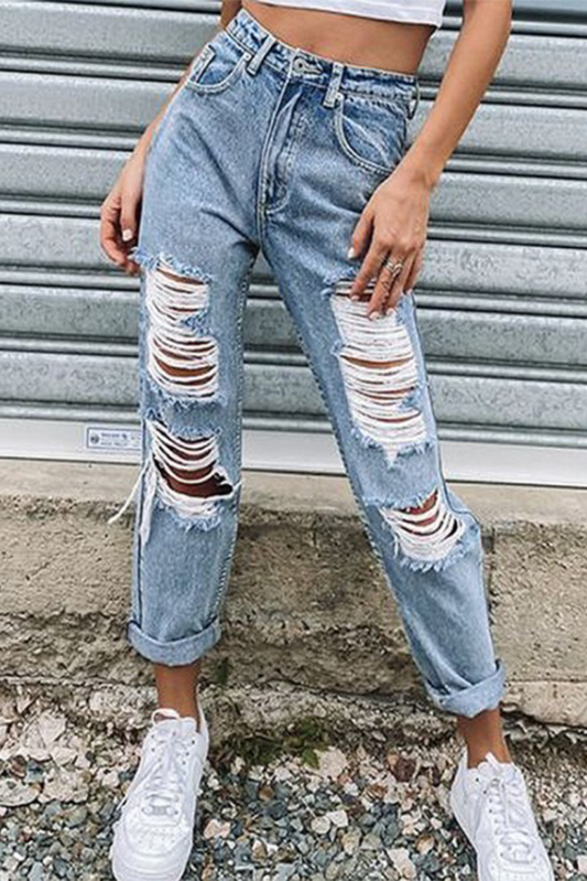 Pantalones rectos rotos con borlas lisas de calle