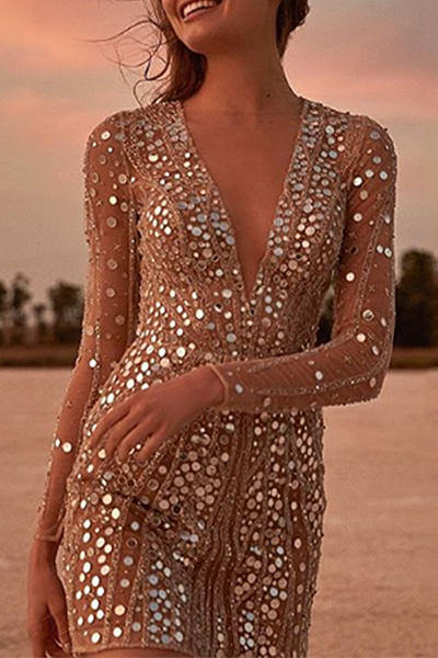 Vestidos elegantes de moda con lentejuelas y retazos de malla transparente con cuello en V y falda lápiz