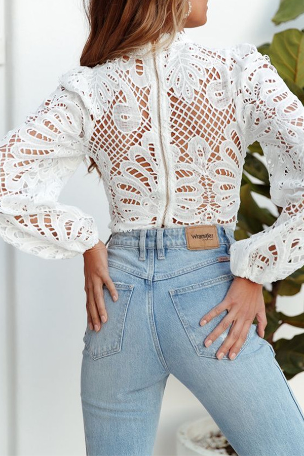 Elegante blusa de cuello mandarín con cremallera ahuecada y color sólido