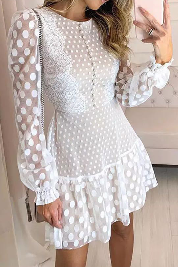 Elegante vestido de falda con cintura redonda, cuello redondo y encaje de lunares