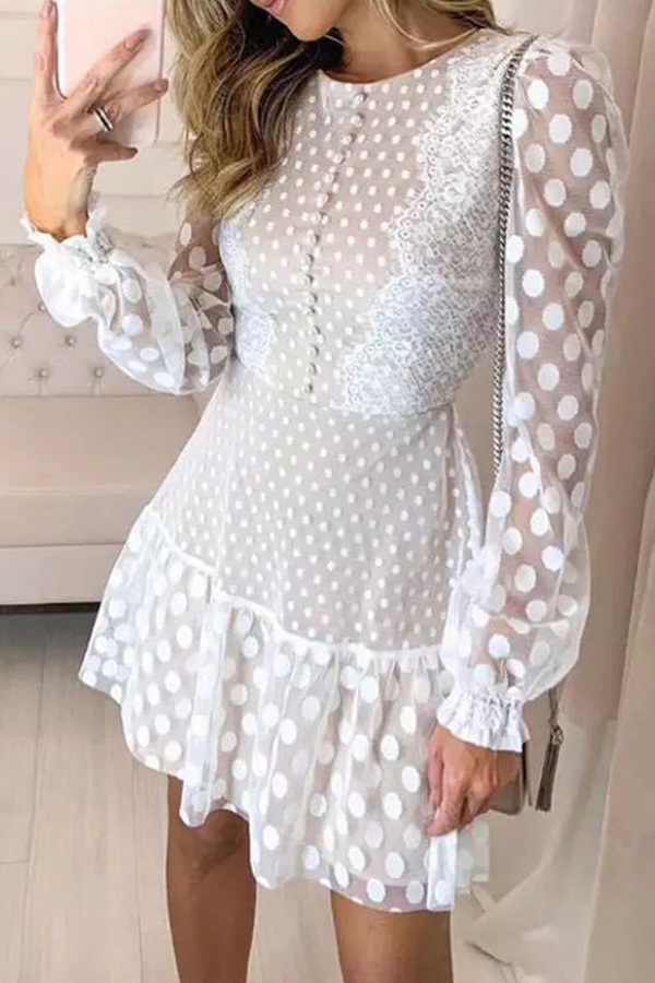Elegante vestido de falda con cintura redonda, cuello redondo y encaje de lunares