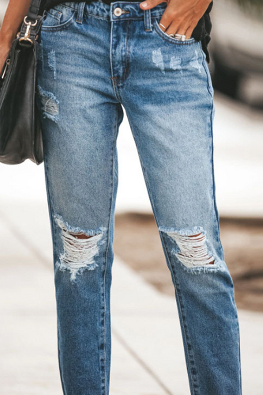 Pantalones rotos con borlas lisas de calle