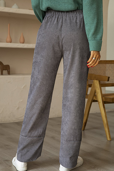 Pantalones casuales de color liso con abertura y bolsillos rectos